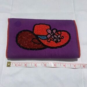 Vibrant Purple Beaded Clutch with Orange Hat Design